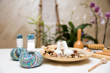 Aromatic herbal massage bags with herbs and wooden maderotherapy tool