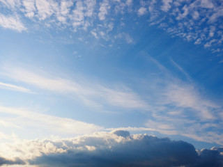 Obraz premium White clouds on a blue sky background