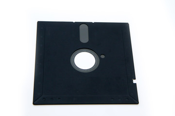 The old retro PC 5 and 1/4 floppy disc isolated on a white background. 