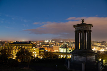 The National Monument and Nelson Monument on Calton Hill on a night light twilight be for sunrise landscape of edinburgh, Scotland , UK