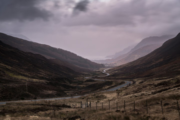 A bracketed HDR winter image looking down Glen Docherty towards Loch maree and Kinlochewe in the rain, Wester Ross, Scotland. 29 December 2019