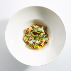 Tortellini with Perch and Tomato Sauce in Restaurant Isolated