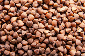 Dark Buckwheat texture high-quality photo of premium buckwheat groats. Top view