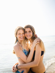 Fototapeta na wymiar Two girlfriends on the beach