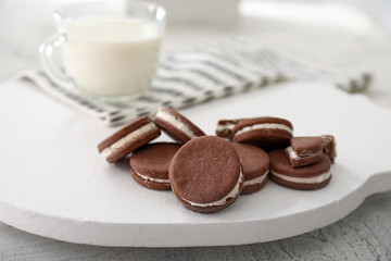 Tasty chocolate cookies on table