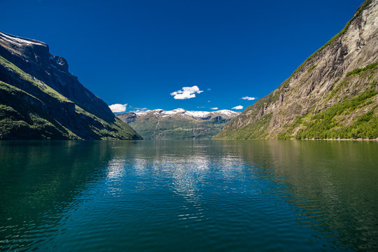 Landscape views inside the Geiranger fjord taken by the ferry hellesylt geiranger