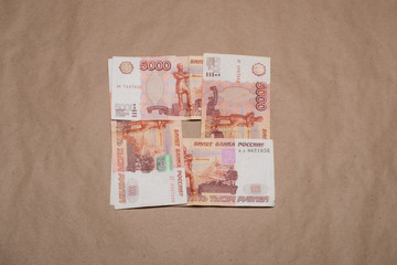 Russian money studio image. Russian rubles. Russian money bills on a beige background.