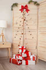 Obraz premium Interior of room with creative Christmas tree