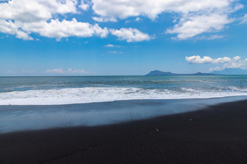 Black sand beach near by the town Ende. Ende, East Nusa Tenggara, Flores, Indonesia.