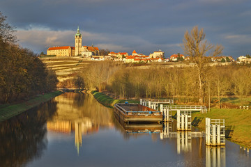 Central Bohemian castle Melnik mirroring in water 