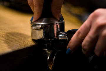Cappuccino preparation process in coffee shop. Profession barista. The invigorating coffee drink.