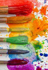 LGBTQ concept of colors made with the help of watercolor paints and brushes of azalea flowers on a...
