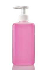 Pink bottle of liquid soap or gel with a pump on a white isolated background close-up.