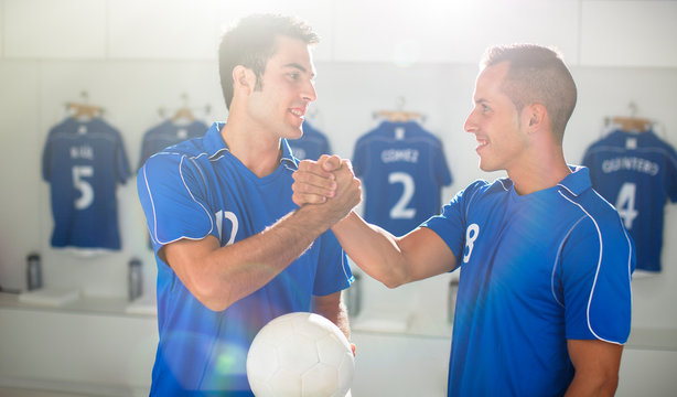 Soccer Players Shaking Hands In Locker Room