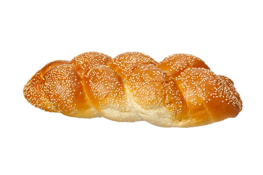 One baked braided challah with seeds