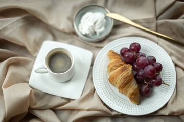 beautiful breakfast with croissant and cheese