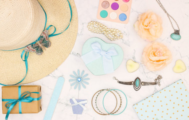 Femininity and girly stylish pastel blue colored accessories and decorations.