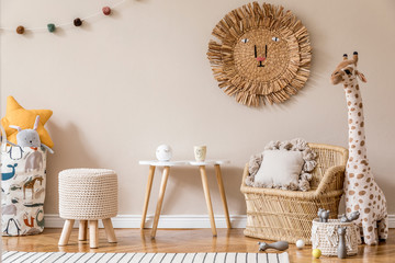 Stylish scandinavian interior of child room with natural toys, hanging decoration, design...