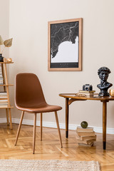 Stylish interior design of private library room with mock up poster map, brown chair, wooden table, bookstand, books and elegant personal accessories. Retro vintage home decor. Beige wall. Template. 