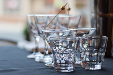 whisky and wine tasting table with stainless steel Martini picks arranged on top of a black cloth in a north Virginia distillery 