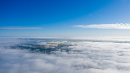 Yellow and blue dawn over clouds, concept, travel and leisure.