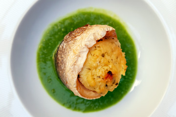 Sea bass with pea sauce, ready to eat.