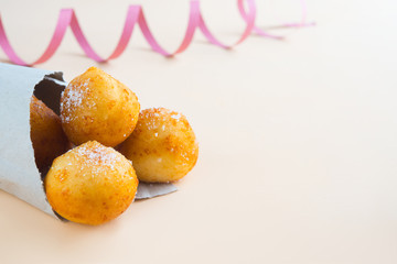 Carnival italian fritters on brown background