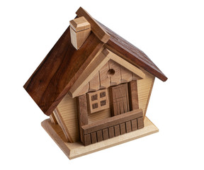 wooden house piggy bank on a white background