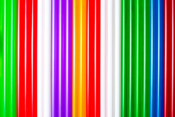 Colorful background, tubules for a cocktail.