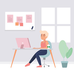 Woman working on her computer in an office