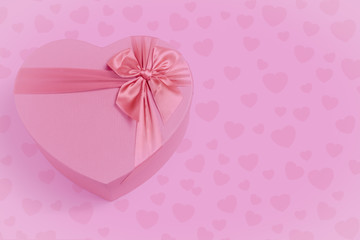 Valentines day concept. Heart shaped Valentines Day gift box with ribbon