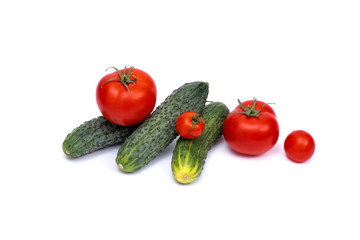 Tomato with cucumber on white background with clipping path. Ripe vegetables isolated on white background. Tomatoes, cucumber on isolated on white background..