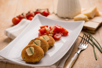 vegetarian ricotta cheese hamburger with tomatoes salad