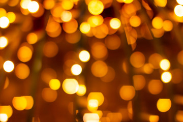 Orange bokeh defocused blurred lights. Abstract background