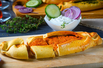 Pide with minced meat, spinach feta and sheep's cheese