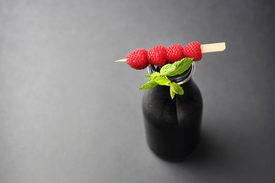 Black Lemonade, A Healthy Drink With Activated Carbon With Raspberries And Myth.