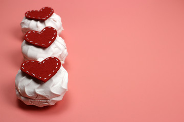 Marshmallows and felt hearts. Valentine's day, love, Dating concept, copy space