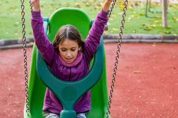 Little girl playing in park