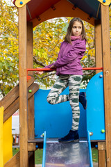 Little girl playing in park