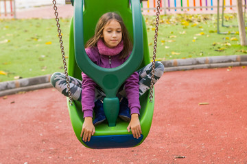 Little girl playing in park