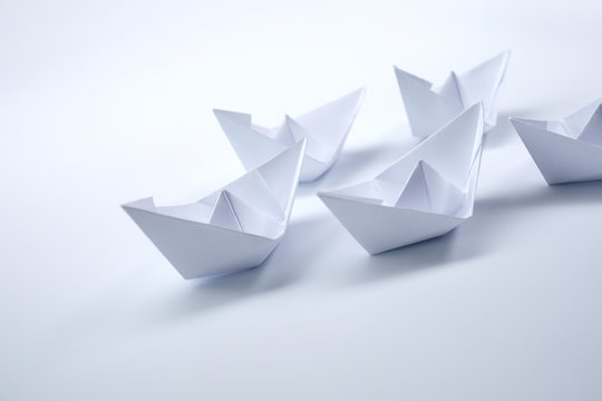 paper boats on the white background