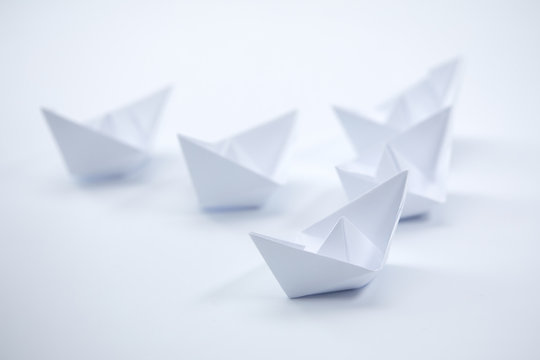 paper boats on the white background