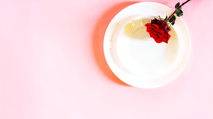 Romantic table setting for Valentines day or dinner date celebration wedding.