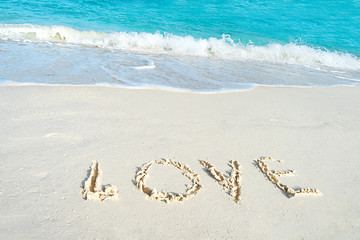 Love on the sea sand beach.