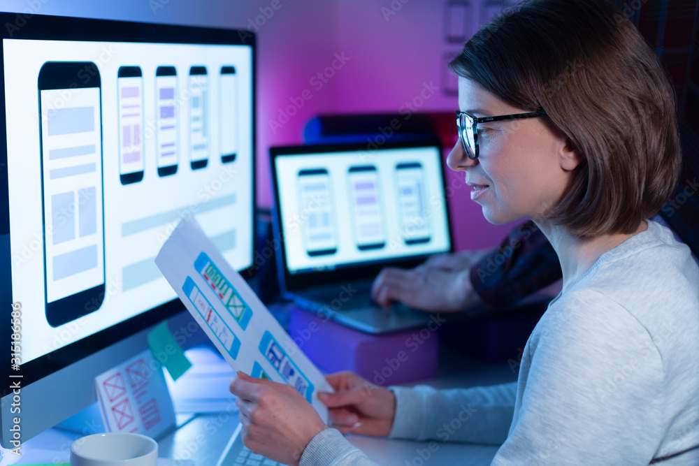 Poster a team of ux designers create an application interface for smartphones. engineers developed user ske