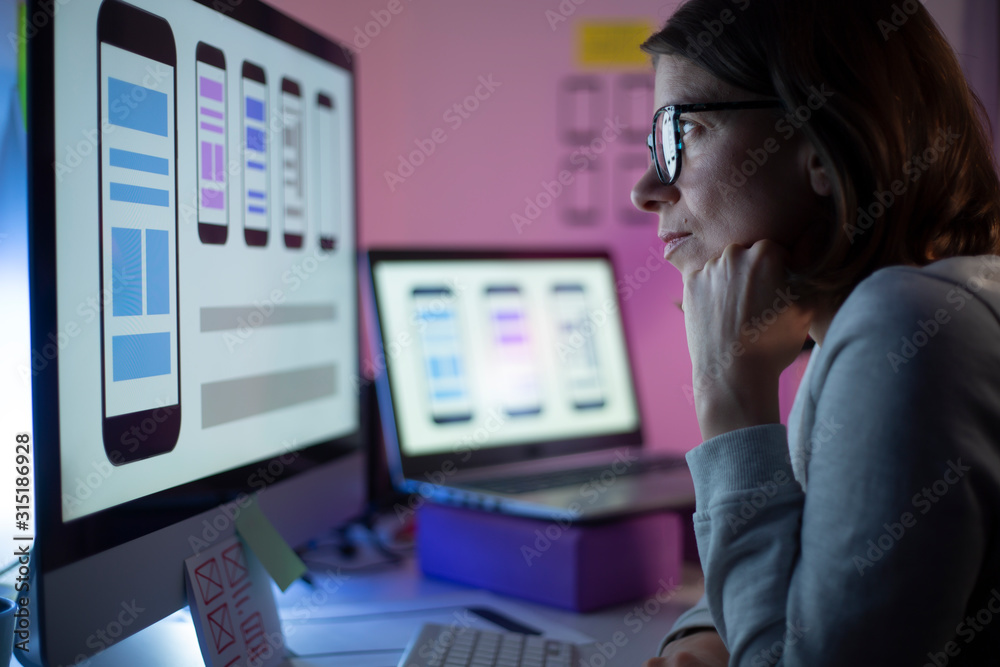 Poster ux designers engineers are developing a mobile phone application interface. user experience.
