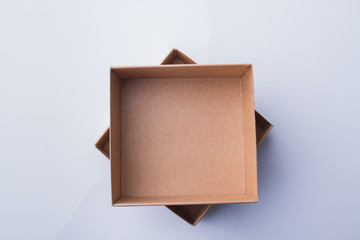 Stack of two box pieces, top view. Two-piece box, flat lay, isolated on white.