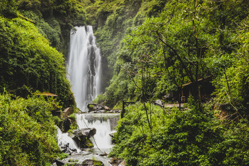 Cascadas de peguche,.A small waterfall in a lush green environmnent in Ecuador, close to Otavalo.