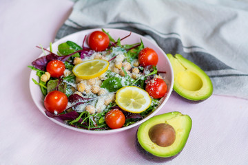 Avocado Salad with Cherry Tomatoes and Baby Spinach  .Healthy Food