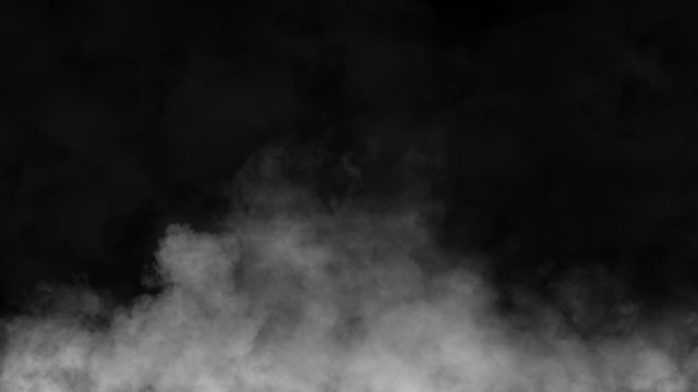 Paranormal mystic smoke on the floor. Fog isolated on black background.